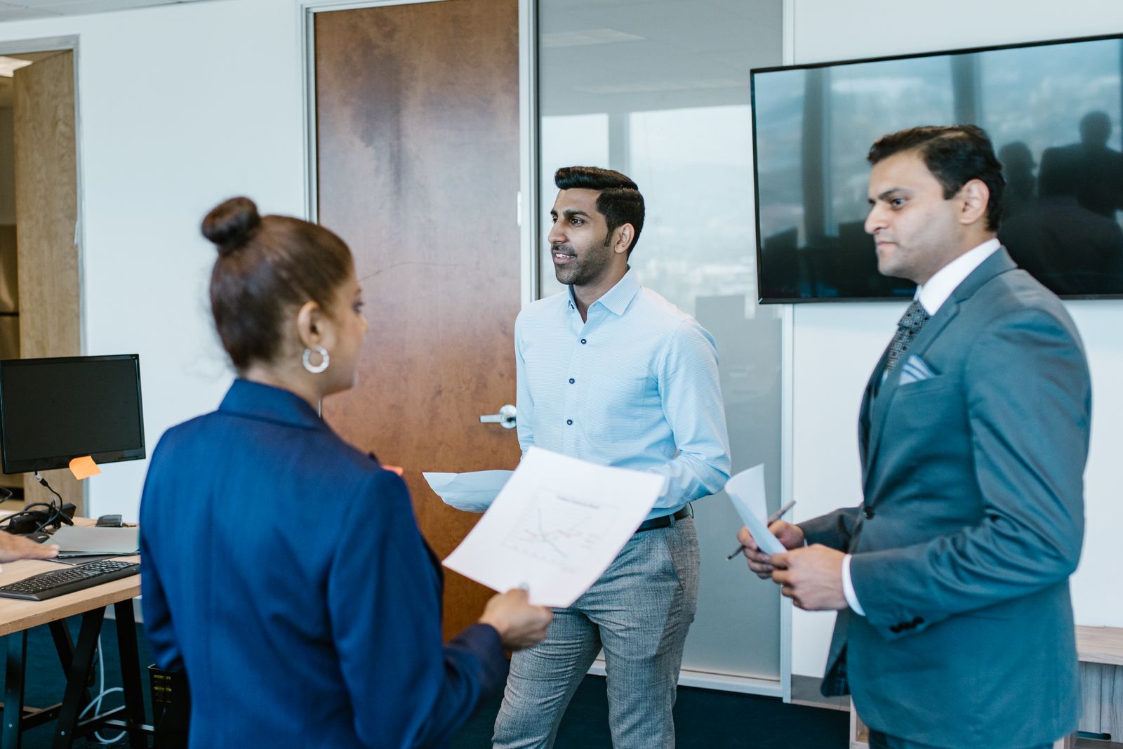 The Webority team collaborating in a modern office.